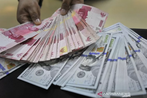 Rupiah Menguat Tembus Rp14.000 Per Dolar