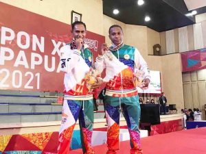 Pertama Tampil di PON, Dua Anggota Polisi Ini Persembahkan Emas untuk Papua